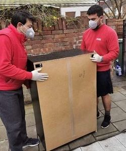 house movers with mask against virus transmission